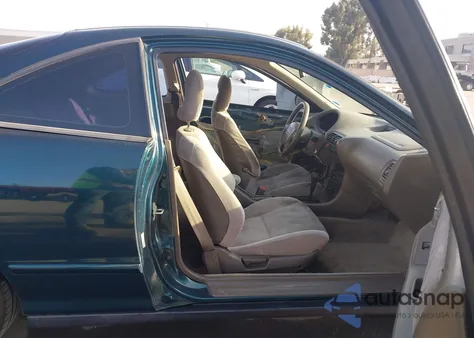 1997 Acura Integra Ls z USA, uszkodzony, nr VIN JH4DC4455VS009731